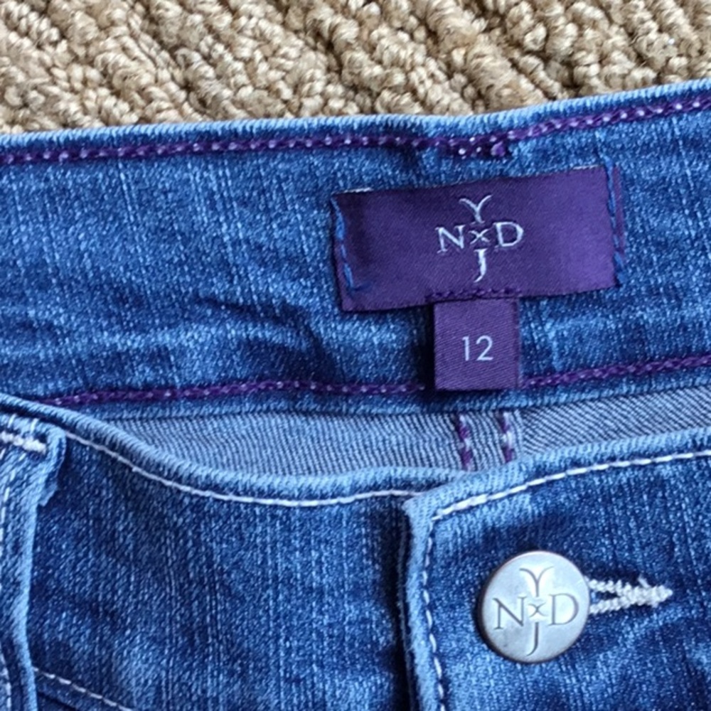 NYDJ Stunning Crop Jeans! Never worn. Size 12. studded accents. NWOT